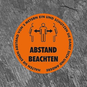 Rutschfester Fußbodenaufkleber "Abstand beachten"